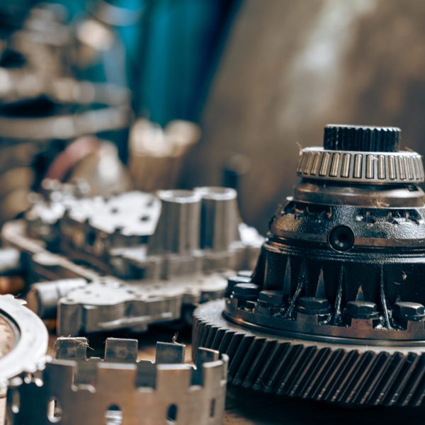 Steampunk texture, background with mechanical parts, gear wheels Stylized of a steampunk mechanical, metal gears are engine, gearbox or rotor parts. Parts and parts of construction equipment