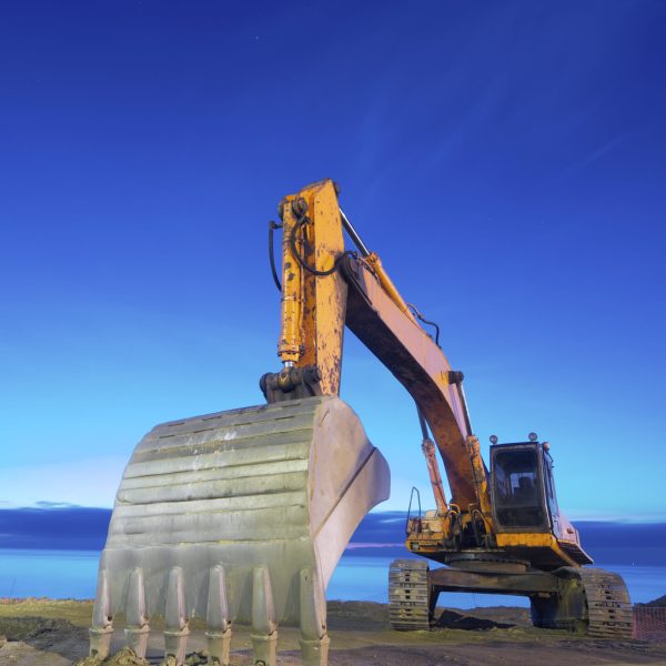 view-of-a-yellow-backhoe-on-a-beach-at-sunrise-2026-03-26-01-19-18-utc